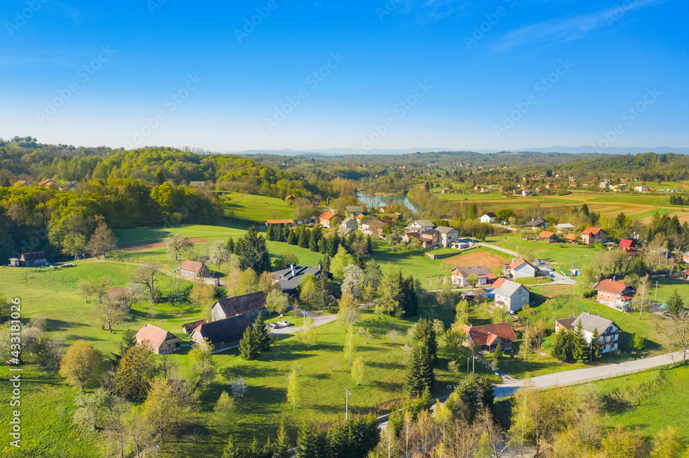 Beautiful green countryside landscape, Mreznica river in Belavici village from air, Croatia