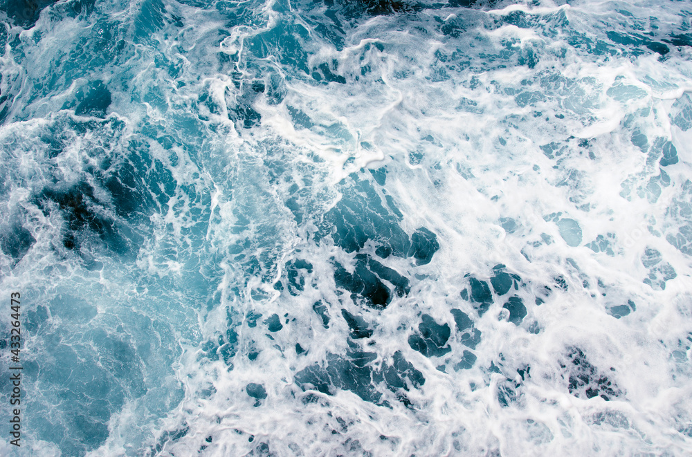 Aerial view to ocean waves.