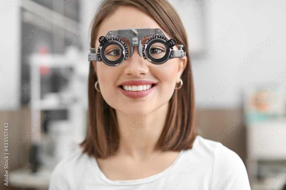 Young woman visiting ophthalmologist in clinic