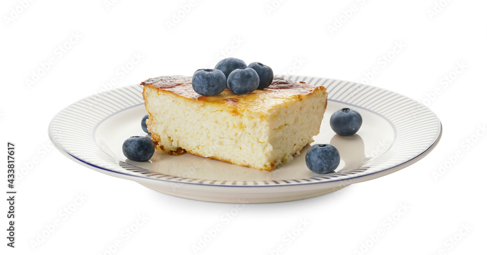 Plate with piece of cottage cheese casserole on white background