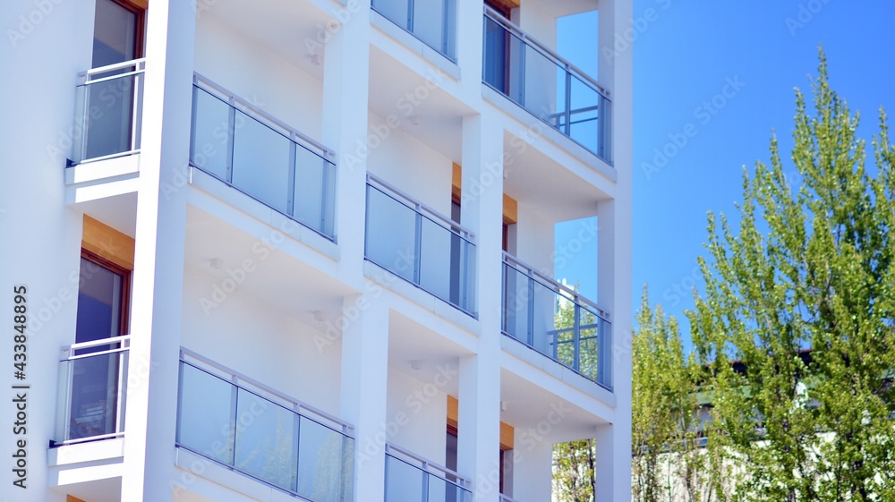 Details in modern white residential flat apartment building.  European architectural complex, downto