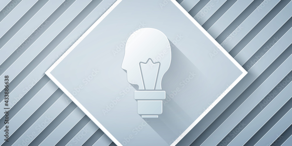 Paper cut Light bulb with concept of idea icon isolated on grey background. Energy and idea symbol. 