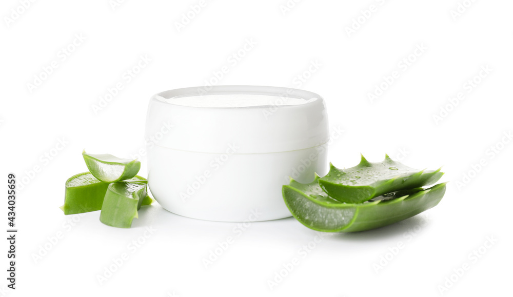 Jar with natural cream and aloe pieces on white background