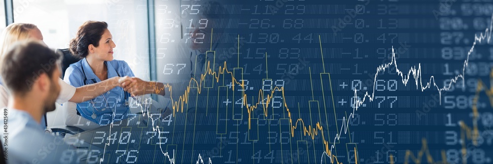 Composition of financial data processing over businessman handshake in background