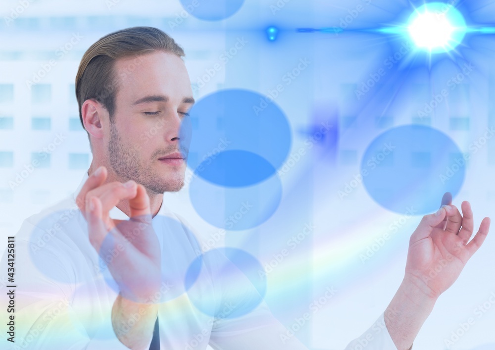 Composition of businessman with eyes closed meditating with blue spots of light in background