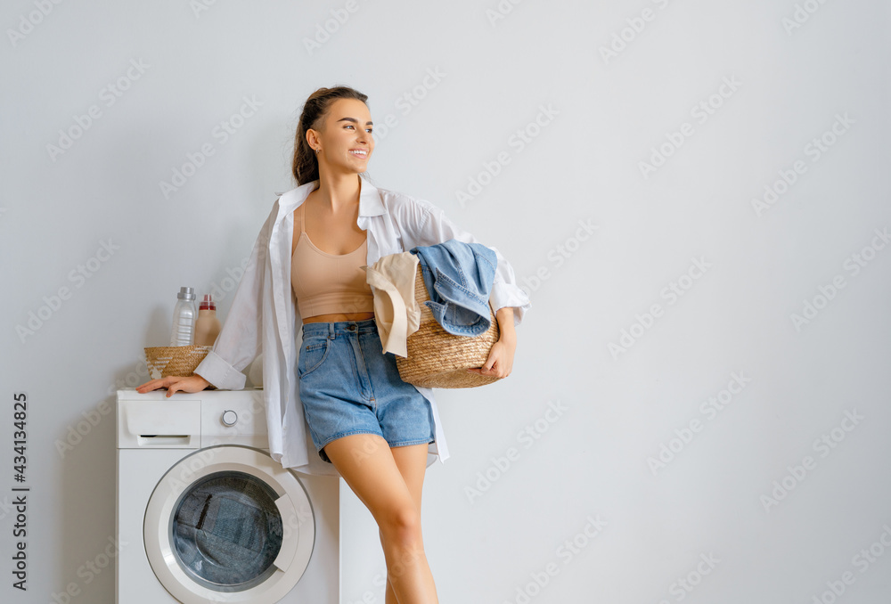 woman is doing laundry