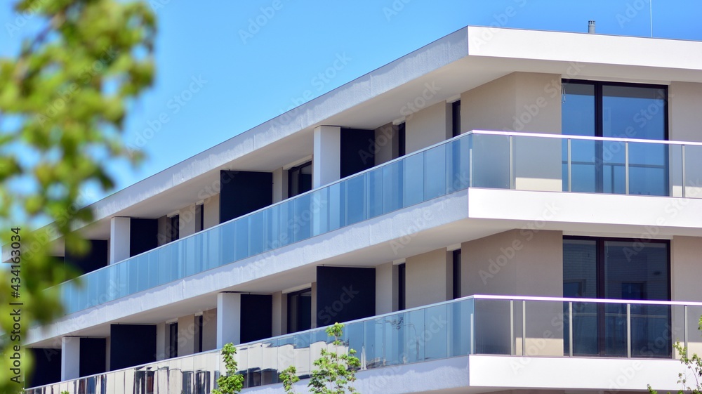 Condominium and apartment building with  symmetrical modern architecture. Detail in modern residenti