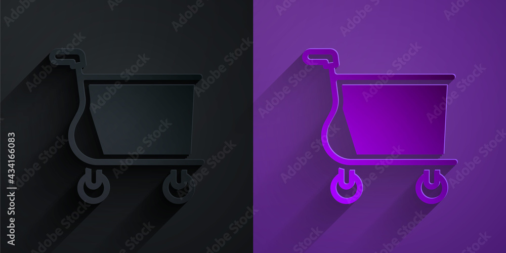 Paper cut Shopping cart icon isolated on black on purple background. Online buying concept. Delivery