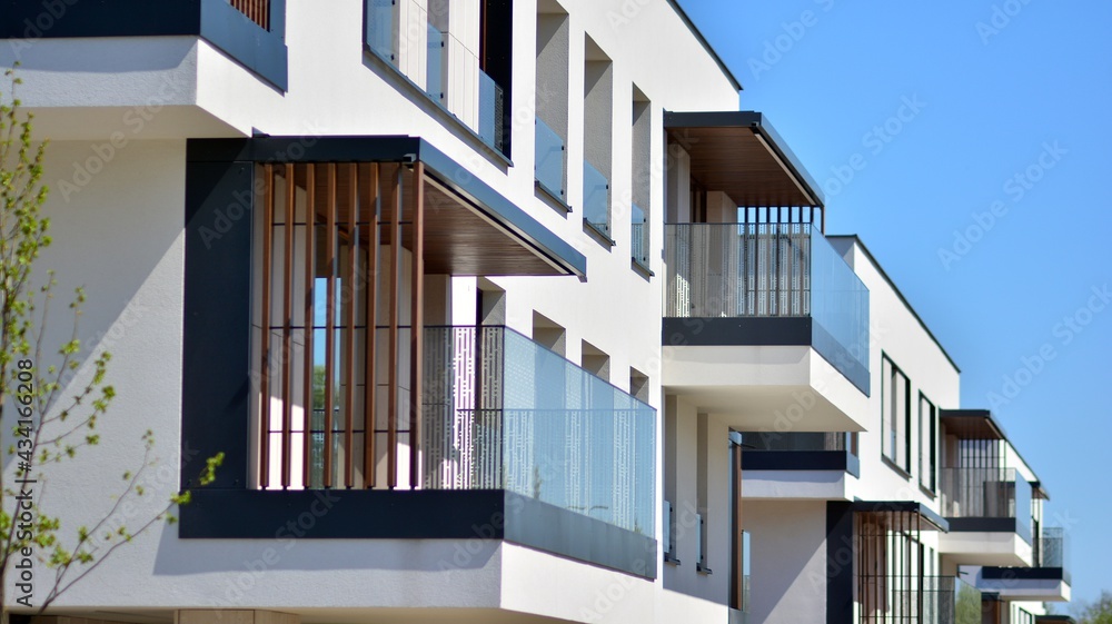 Condominium and apartment building with  symmetrical modern architecture. Detail in modern residenti