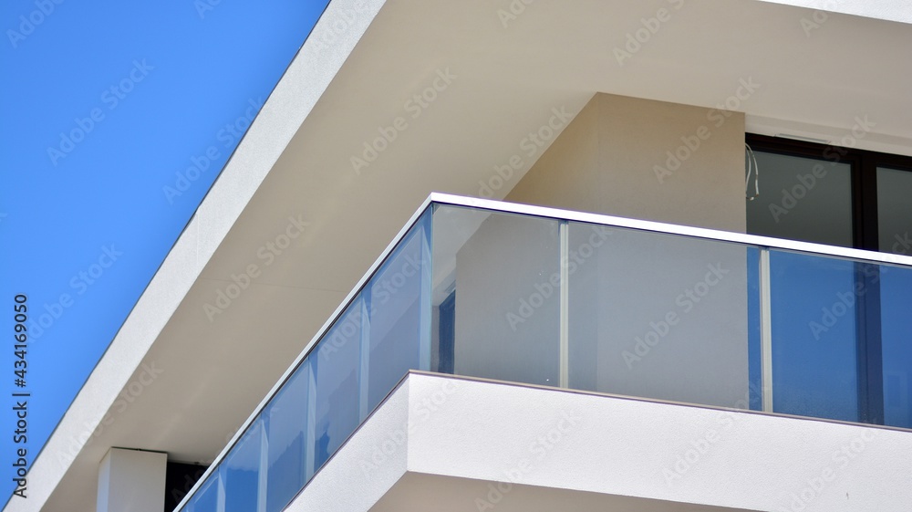 Condominium and apartment building with  symmetrical modern architecture. Detail in modern residenti