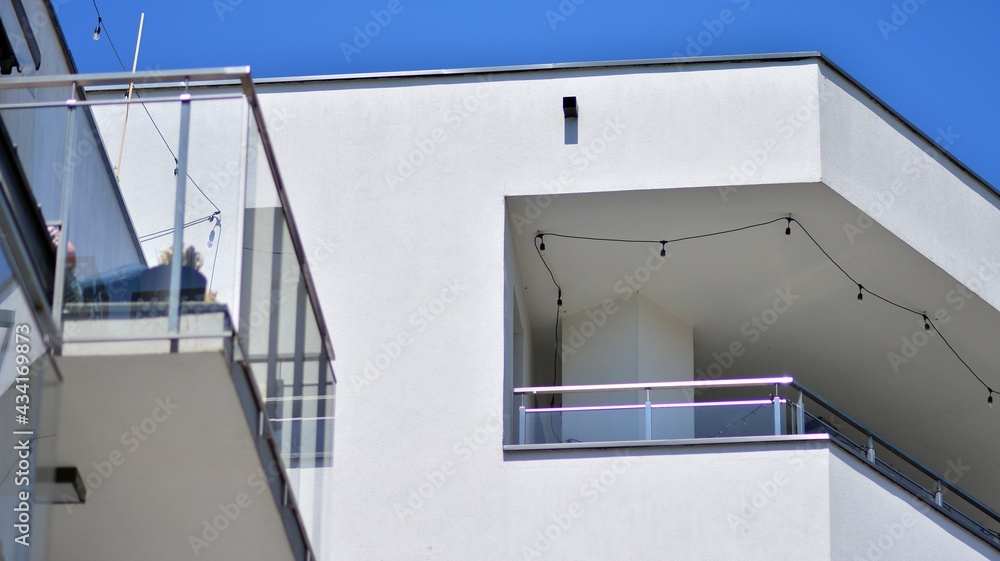 Condominium and apartment building with  symmetrical modern architecture. Detail in modern residenti