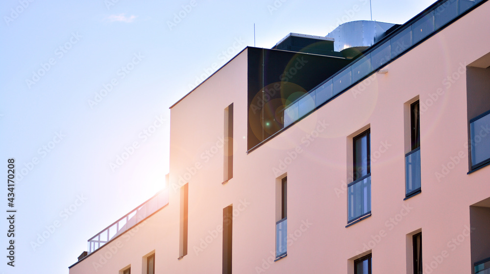 Apartment residential house and home facade architecture and outdoor facilities. Blue sky on the bac