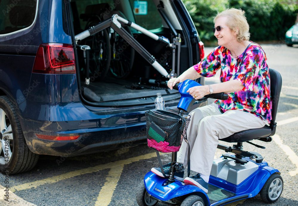 Senior woman on an electric wheelchair