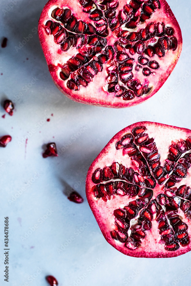 Fresh pomegranate cut in half