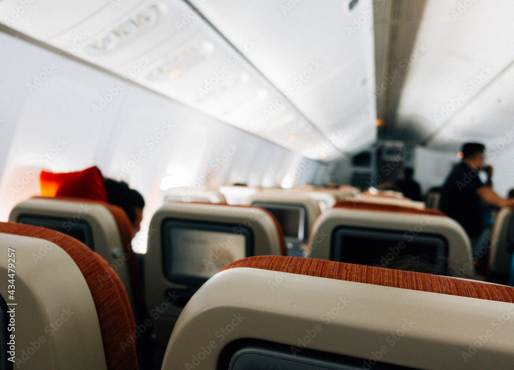 Passengers in an economy class airplane