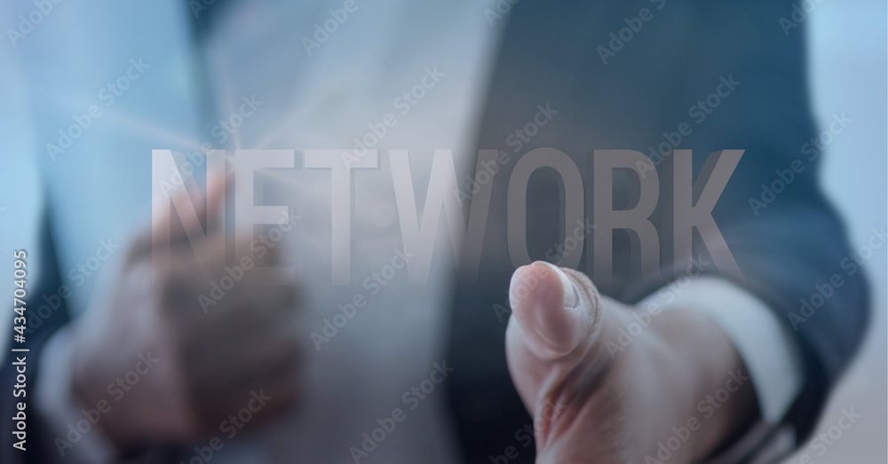 Network text against mid section of businessman approaching for a hand shake