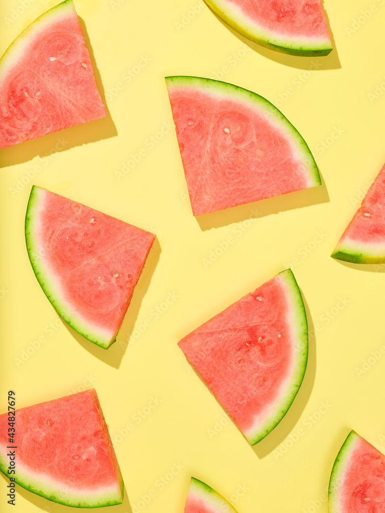 watermelon slices on yellow background