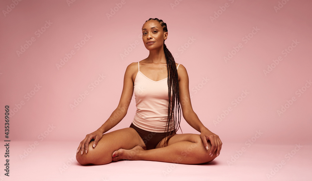 Portrait of mature black woman in underwear