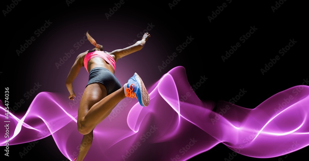 Composition of athletic woman running on black background