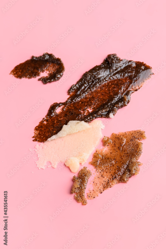 Samples of body scrub on color background