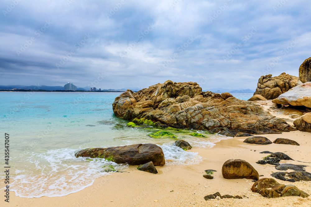 Landscape with beach,the sea and the beautiful clouds.rocks on the beach.