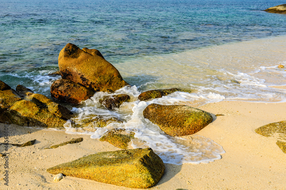 Beautiful beach and sea water with rocks by the sea.high angle view.