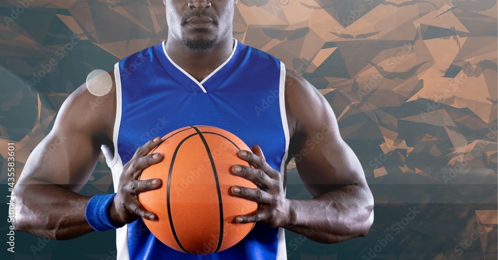 Composition of midsection of basketball player holding ball with copy space