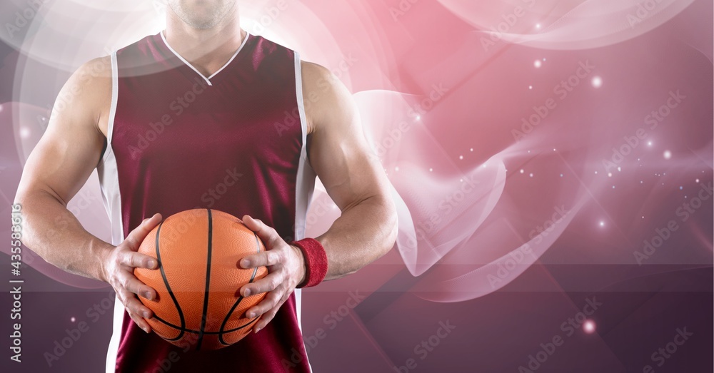 Composition of midsection of basketball player holding ball with copy space