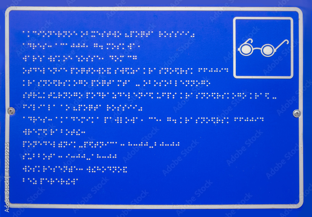 Table with lettering of braille for blind people. A tactile writing system for people with visual im