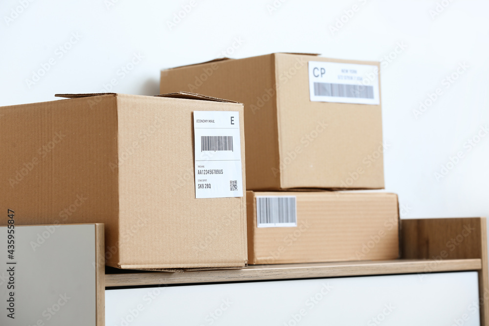 Parcel boxes on shelf at home