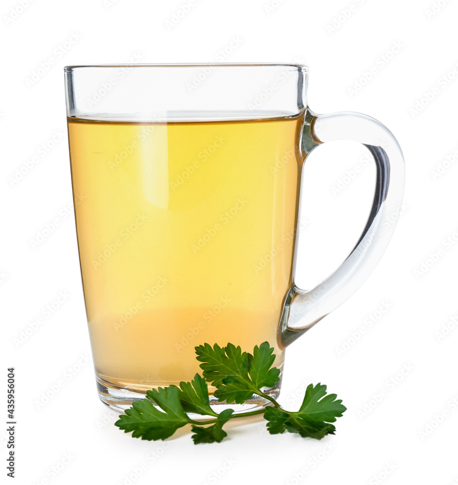 Cup of hot tea with parsley on white background