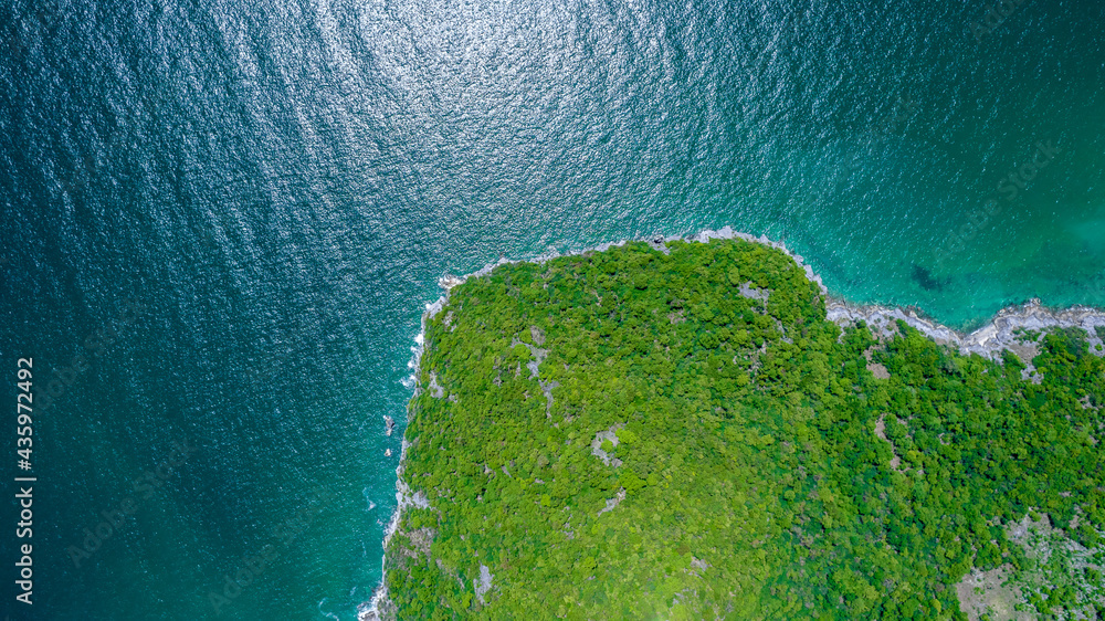 Aerial top view of  sea arond island at summer day.