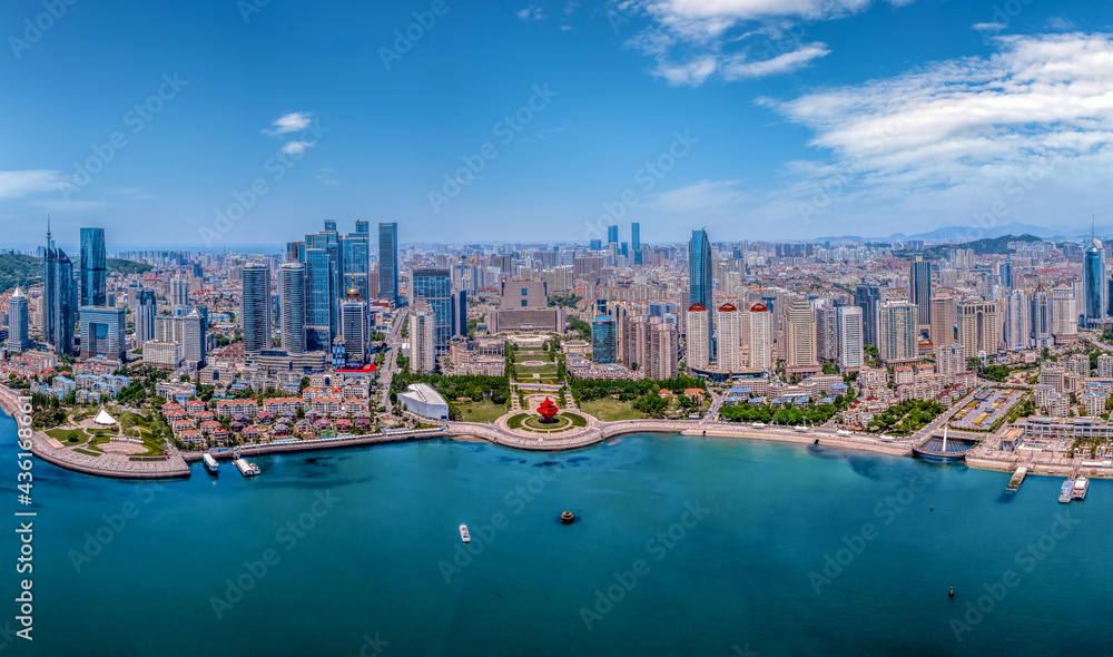 Aerial photography of architectural landscape skyline along Qingdao urban coastline