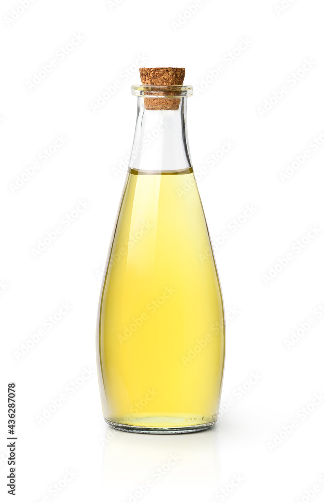 Bottle of vetgetable oil with cork cap isolated on whtie background. Clipping path.