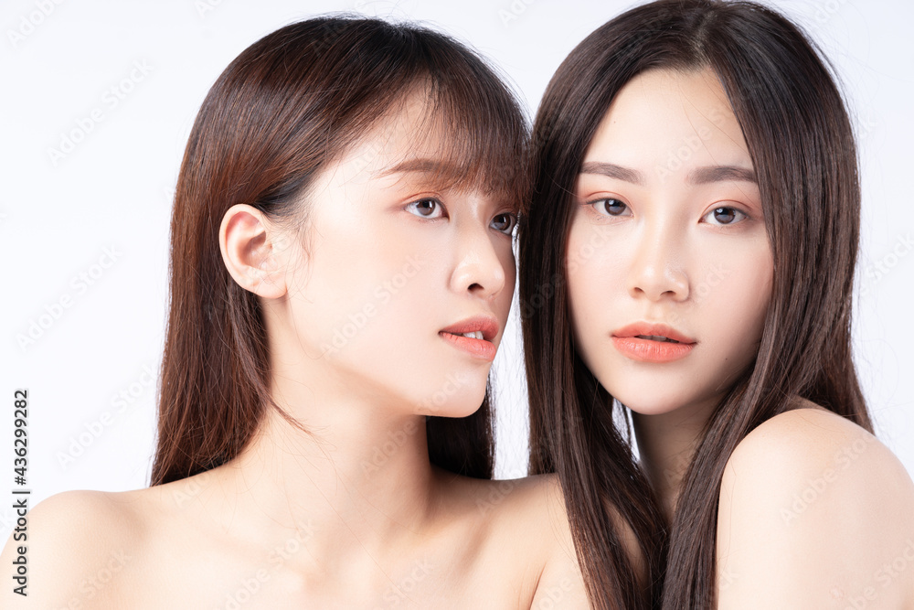 Beauty portrait of two beautiful young Asian girls