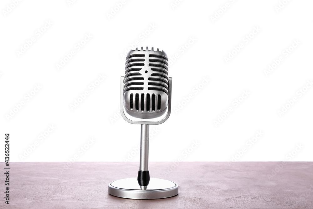 Retro microphone on white background