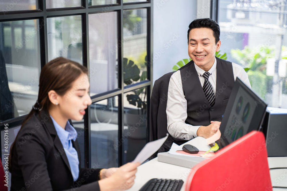 Business man and woman employee work in office discuss company project