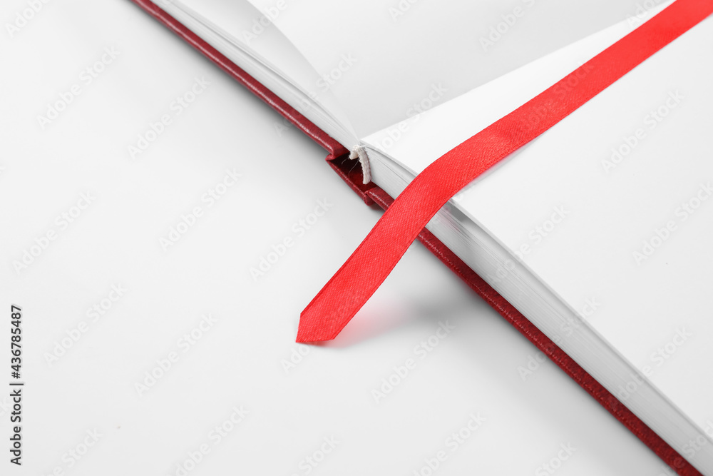 Blank book with bookmark on white background