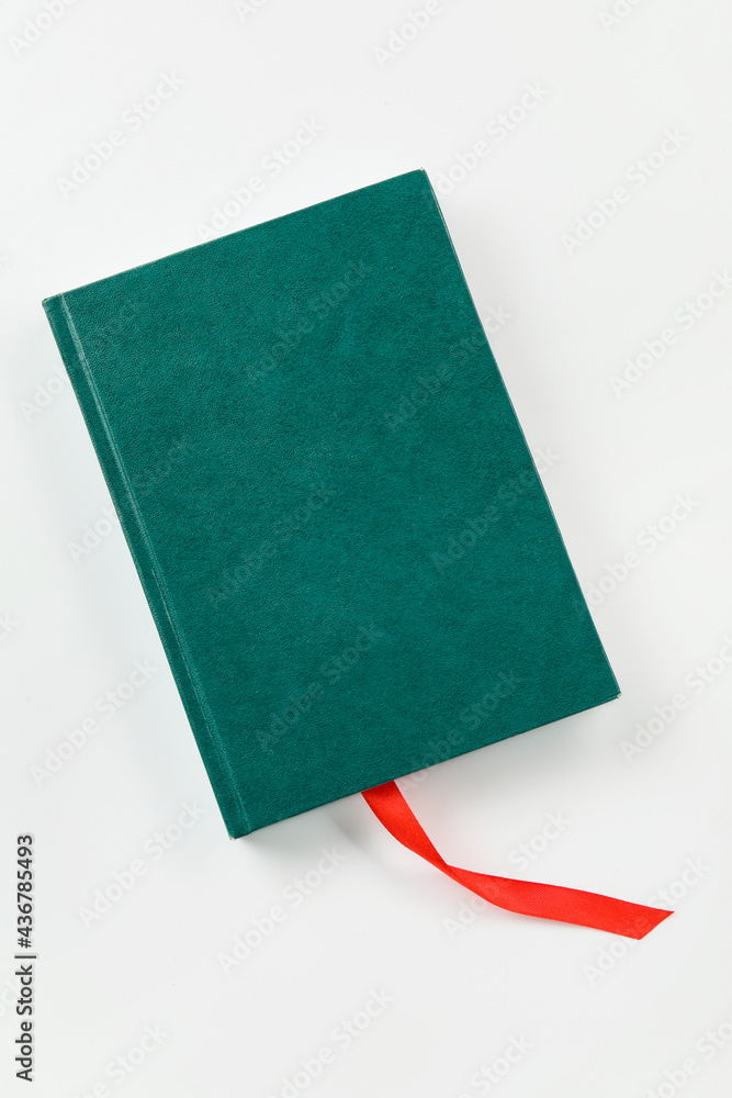 Book with bookmark on white background