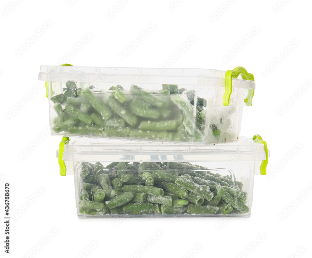 Plastic containers with frozen green beans on white background