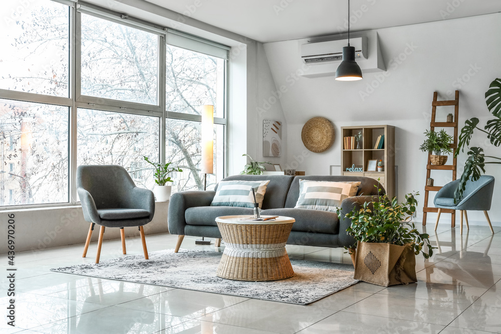 Interior of stylish living room with glowing lamps