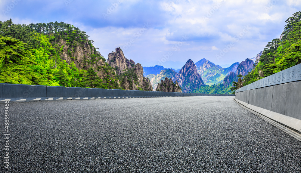 Asphalt highway and mountain landscape,road pavement background.