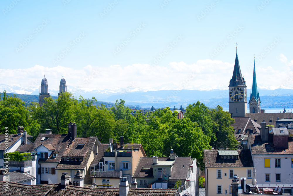 Old town of Zurich with churches St. Peter and Fraumünster (Womens Minster) with lake Zurich and Sw