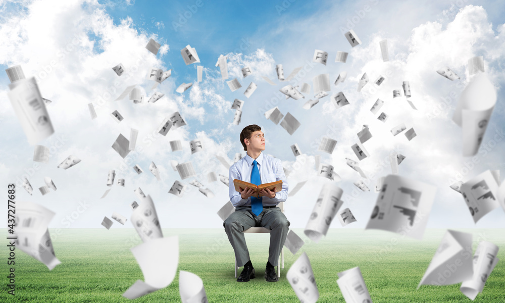 young businessman with book