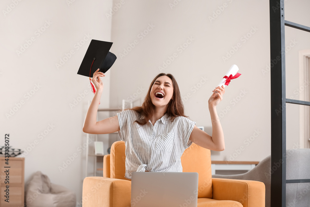 Happy female student on her graduation day at home. Concept of studying online