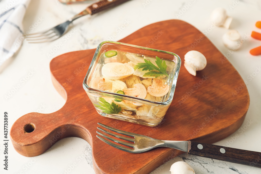 Bowl of tasty aspic on table