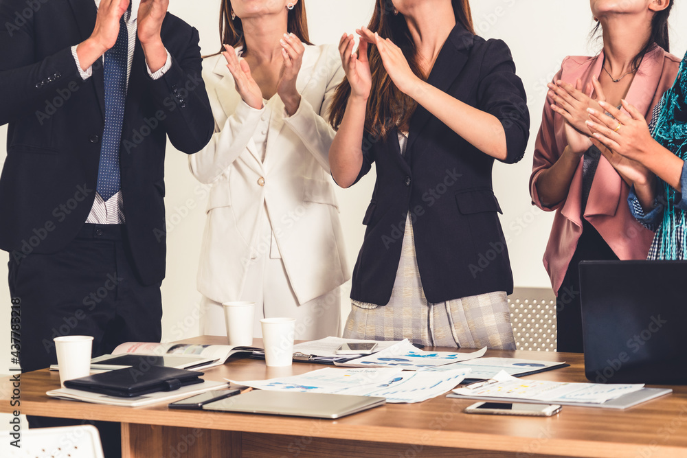 Business people applauding in a business meeting. Conference and presentation award concept.