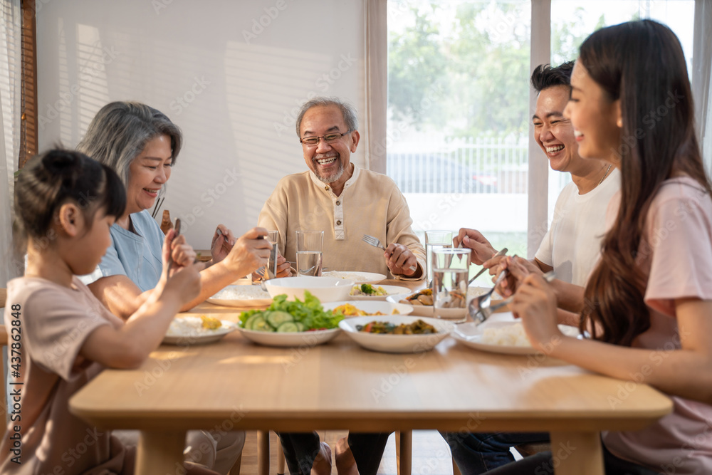 Big happy family have lunch, enjoy eat food on table together at home