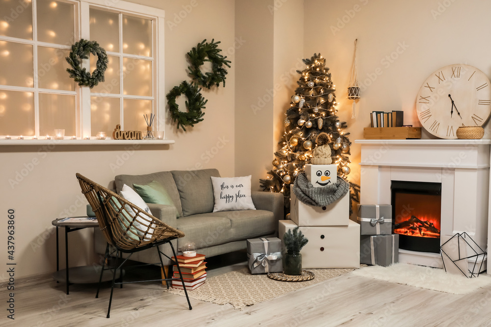 Funny snowman in living room decorated for Christmas