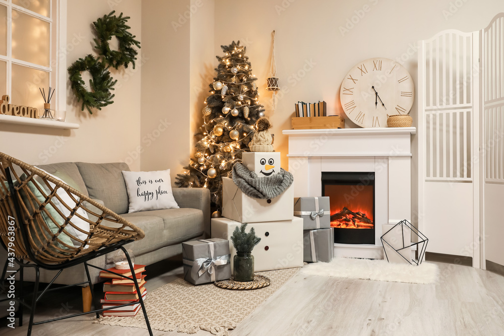 Funny snowman in living room decorated for Christmas